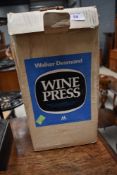 A boxed Walker Diamond wine press