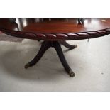 A reproduction Regency style oval coffee table, width approx 120cm