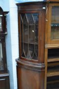 A reproduction Regency corner display cabinet