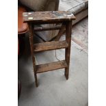 A vintage wooden step ladder, height approx. 65cm