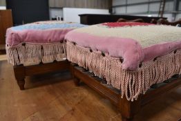 A pair of Victorian stained spindle frame footstools