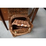 A small collection of baskets , including small hamper