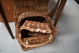 A small collection of baskets , including small hamper