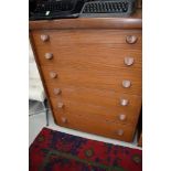 A vintage teak six drawer bedroom chest, width approx. 76cm