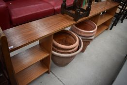 A teak or sapele low bookshelf (maybe fire surround) width approx. 220cm