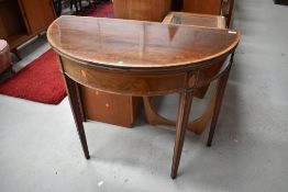A 19th Century Sheraton style fold over card table, having beize top, width approx 92cm