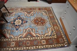 A traditional Persian style rug, nice vibrant colours, russett and blue ground, approx. 225 x 157cm