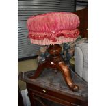 A Victorian mahogany framed piano stool having woolwork seat