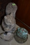 Three concrete garden ornaments, squirrel, frog and rabbit