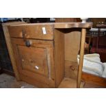 A rustic pine bathroom or similar cabinet with towel rail under, width approx. 52cm