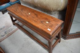 A solid oak narrow box stool, width approx. 108cm