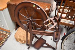 A traditional spinning wheel and accesories