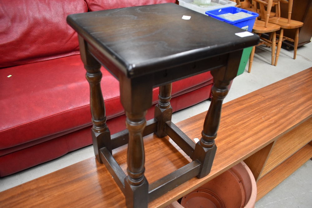 A dark oak occasional table, width approx 30cm