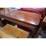 A reproduction mahogany console table, canted corners, width approx. 110cm, depth 42cm