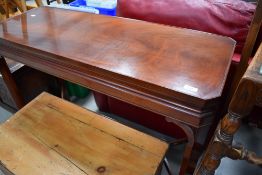 A reproduction mahogany console table, canted corners, width approx. 110cm, depth 42cm