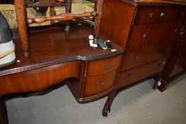 A mid 20th Century bedroom chest and dressing table