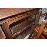 An early 20th Century light mahogany stacking style two tier bookcase, width approx. 94cm, height