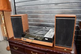 A vintage Pye Black Box table top radiogram and pair of 5754 speakers