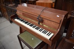 A Bentley electric upright piano