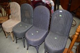 A set of four vintage Lloyd Loom chairs, rare design, various colours, each chair width approx.
