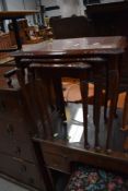 A period style nest of occasional tables having skiver and glass top, max table width. 55cm