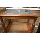 A modern stained frame glass top coffee table, approx. 69 x 54cm