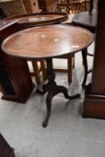 A Victorian mahogany occasional table having circular top, turned column and triple splay legs,