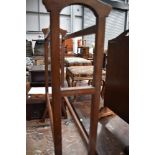 An Edwardian mahogany and inlaid towel rail, width approx. 70cm