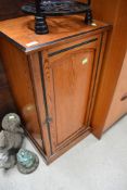 A Victorian pitch pine pot cupboard in the Aesthetic style