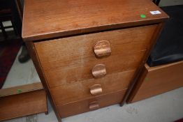 A vintage teak or sapele four drawer bedside or similar chest, width approx. 44cm