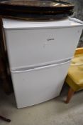 A Lowry fridge freezer of small proportions, height approx. 84cm, used but clean, bottom plastic