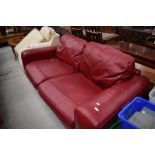 A modern settee , very clean oxblood leather, width approx. 220cm, depth approx. 110cm