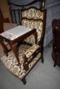 A Victorian style stained frame armchair and an early 20th Century Queen Anne style dressing table