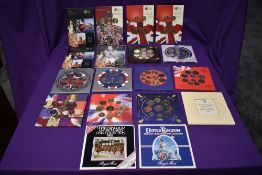 A collection of 18 UK Uncirculated and Brilliant Uncirculated Year Coin Sets comprising, 1983, 1984,