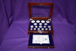 The House of Windsor Silver Coin Collection, 18 coins in Danbury Mint glazed display case