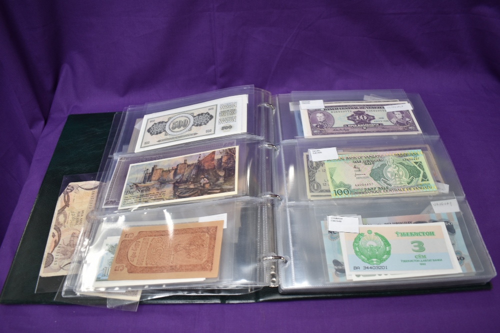 Two albums of World Banknotes, Afghanistan to Zimbabwe, most countries seen, mainly uncirculated