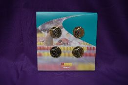 A 2002 Royal Mint Commonwealth Games Manchester four £2 Uncirculated Coin set in folder with high
