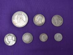 A small group of Commonwealth Silver Coins, British West Indies Anchor Coinage 1822 1/8 Dollar,