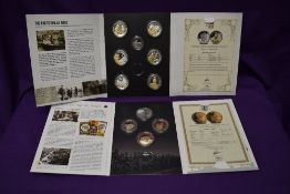 Two Medallion part sets, We Will Remember Them containing 7 medallions and A War To End All Wars