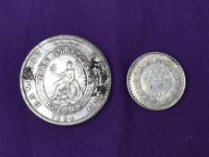 A George III Silver 1804 Five Shillings Dollar along with a George III Silver 1812 1 Shilling &