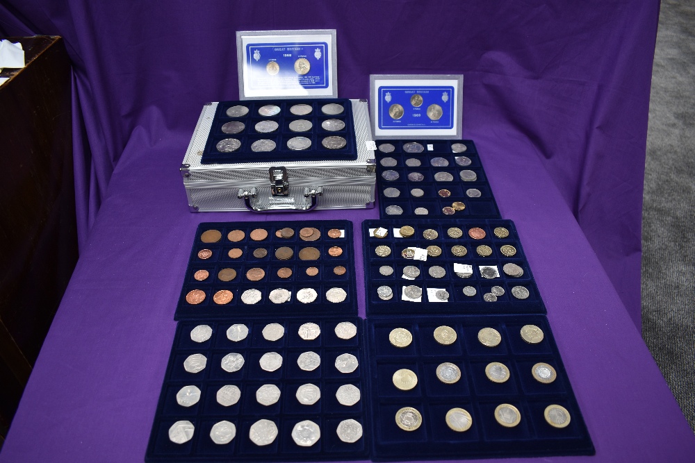 A collection of modern GB Coins, 1/2p up to £5, approx £60 face value, in coin case with 6 trays,