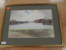 A watercolour, F Ogilby, lake landscape, indistinctly signed, and dated 1911, 25 x 37cm, plus