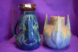 Two large statement pieces of art pottery.