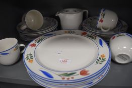 A selection of table and kitchen wares including Tienshan Stoneware mugs plates and bowls