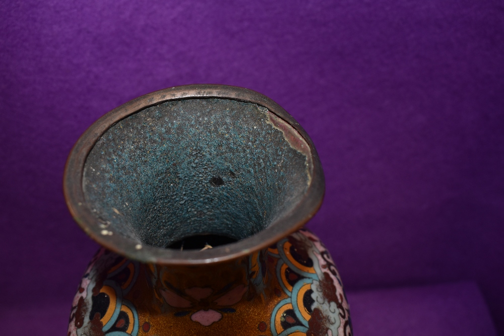 An oriental cloisonne vase having pheonic and dragon decoration having one side badly damaged - Image 6 of 7