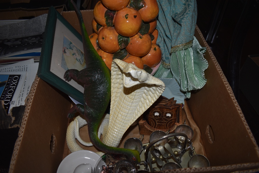 A selection of decorations including large orange fruit bowl in a CappoDemonte style