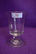 An antique beer glass having trumpet shaped bowl with flat base, slightly domed foot and prominent