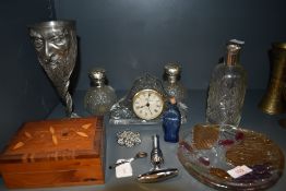 An assortment of items including perfume bottles and inlaid box.