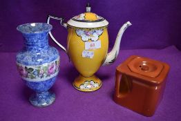 A trio of ceramics amongst which are a 1920s 'the cube' tea pot in terracotta finish and a Fenton