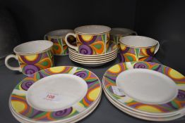 A collection of Enoch Wedgwood cups and saucers and side plate having psychedelic pattern.